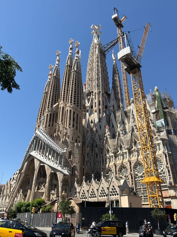 Sagrada Família on a sunny Barcelona afternoon, cranes and all