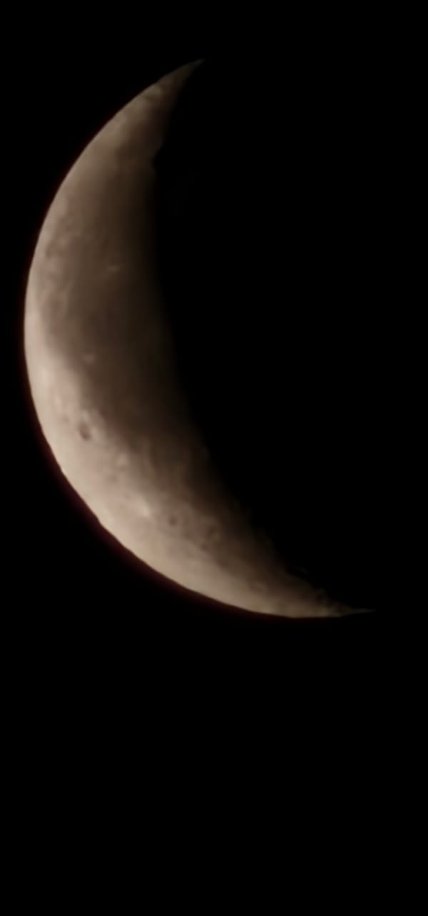 Crescent moon observed over Leudelange, Luxembourg early Tuesday morning