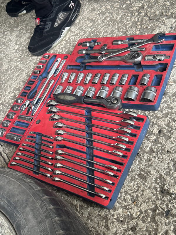 Late night auto repair work captured in Birobidzhan garage