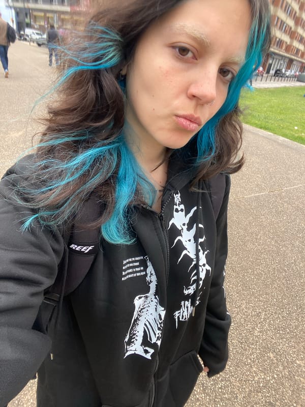 Person takes selfies outdoors and in elevator in Gijón