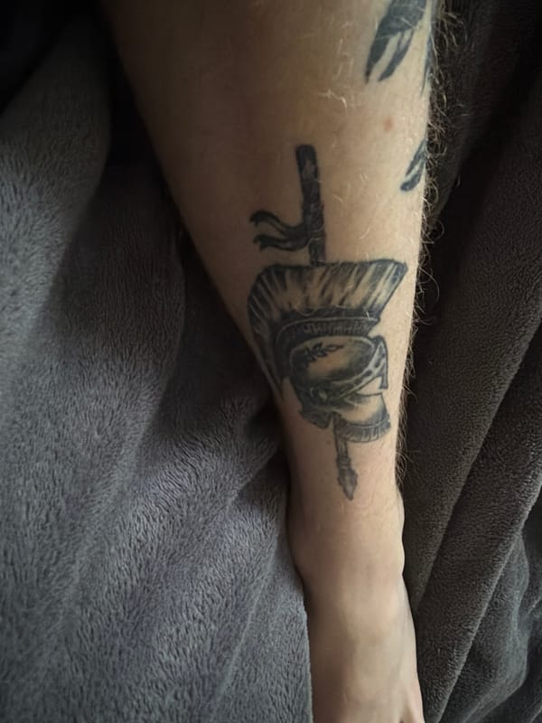 Morning indoor scenes in Vilnius: Spartan tattoo and window light