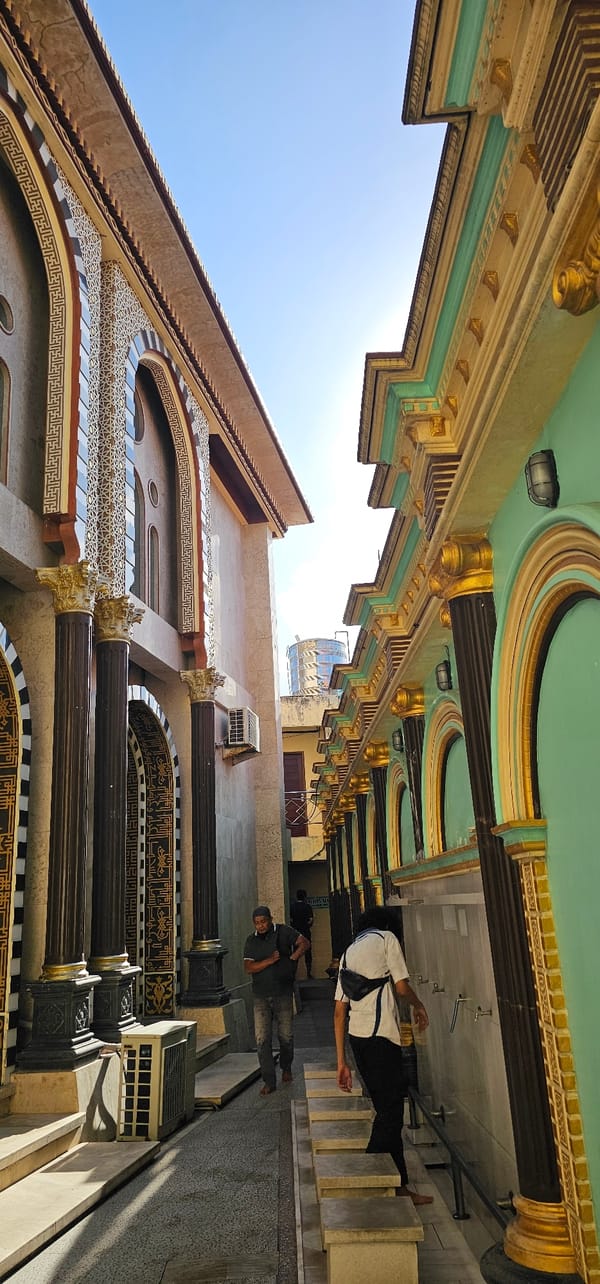 Morning prayer and street life documented at Denpasar mosque
