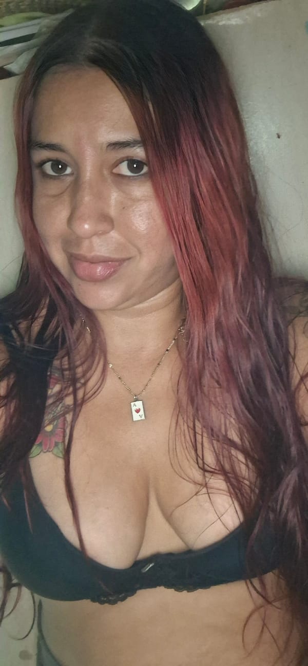 Woman with tattoos documented during art session in Venezuela