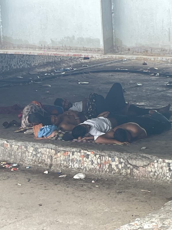 People sleeping rough under Mumbai elevated structure