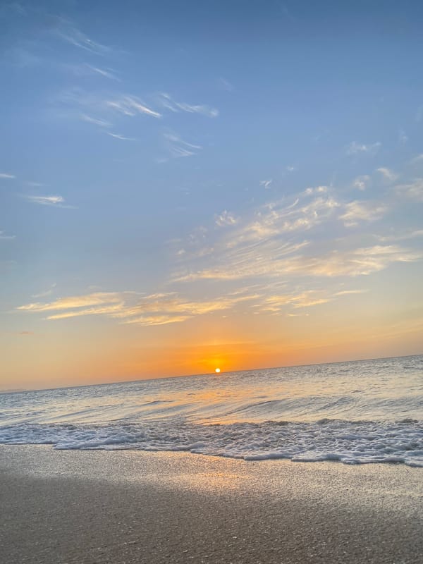 Sunset gathering at Juan Griego beach, Venezuela