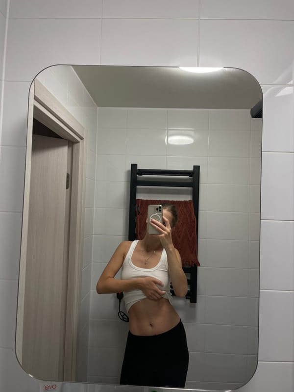 Woman takes mirror selfies in Khimki apartment