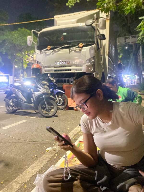 Late-night street food cart serving customers in Tangerang