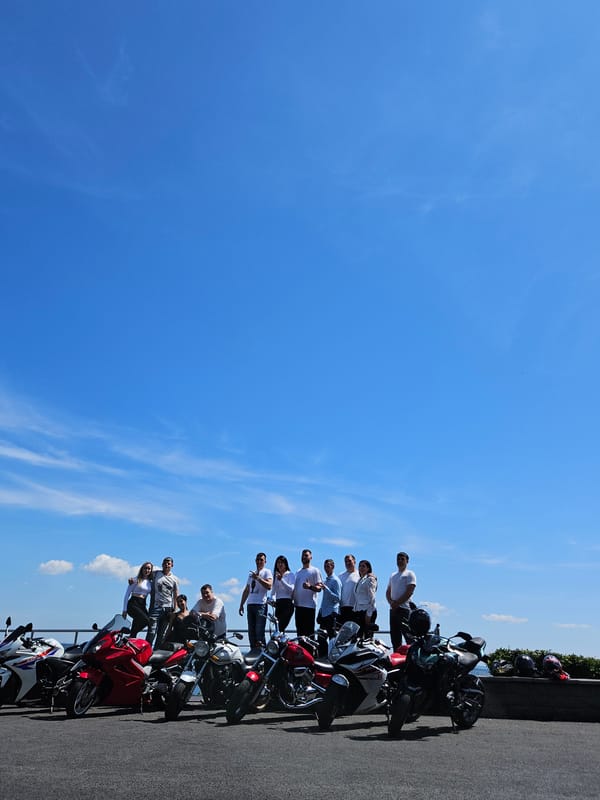 Motorcycle riders gather along Ulyanovsk waterfront on a summer morning