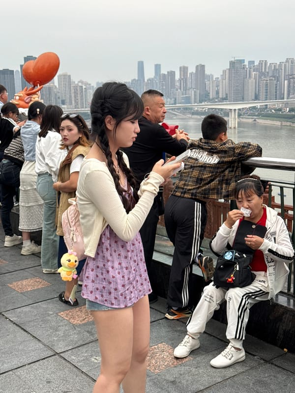 Crowds gather around monuments in Yuzhong District, China