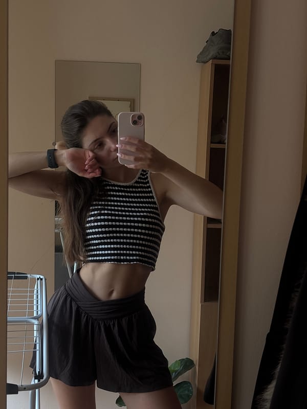 Mirror selfie session in a Varna bedroom, July 2026