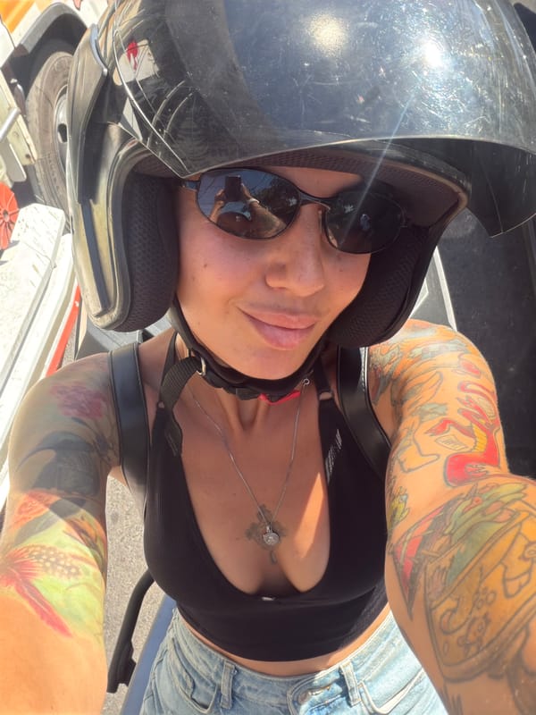 Scooter selfie session on a sunny Kuta Selatan road