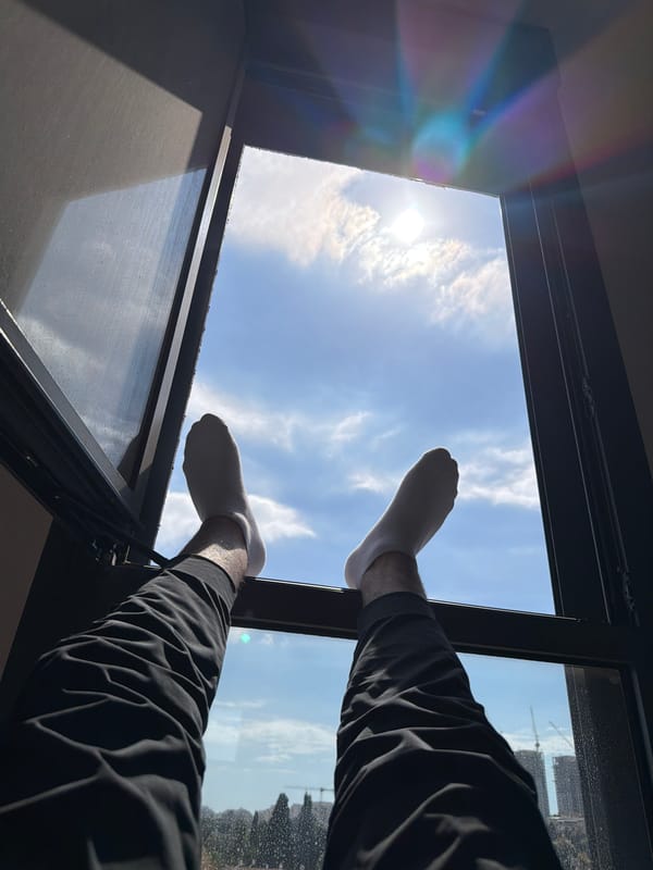 Quiet afternoon moments captured through windows in Ramat Gan