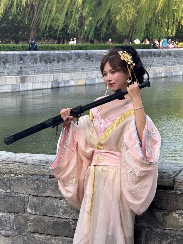 Woman in Traditional Hanfu Poses for Photos in Beijing
