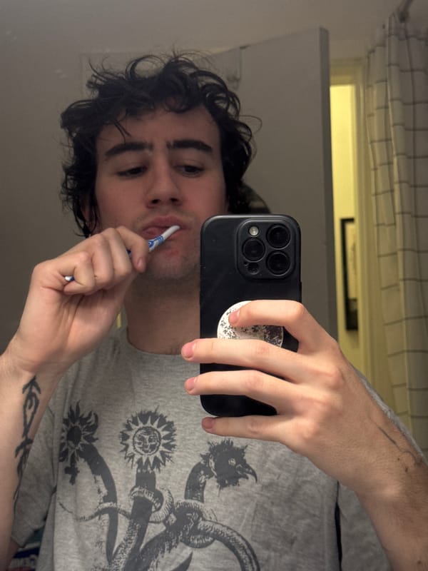 Man takes multiple selfies in Paris apartment
