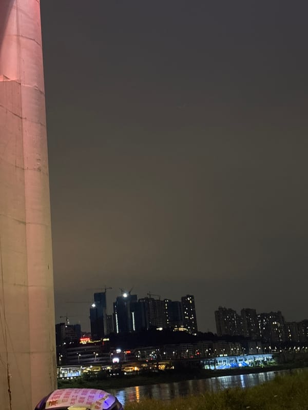 Nighttime waterfront scenes documented in Shapingba District, China