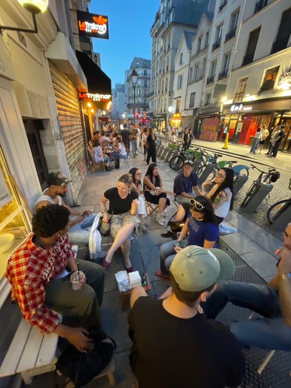 Evening social scenes captured across Paris bars and cafes