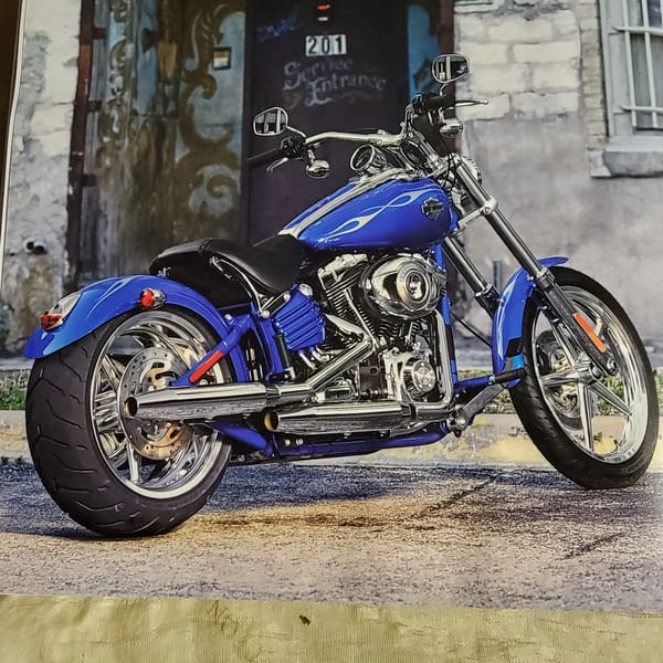 Diverse motorcycle lineup — cruisers, customs, and racers on display