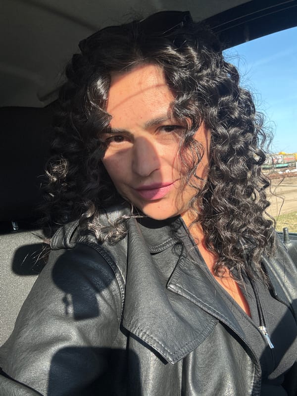 Portrait captured inside vehicle near Kauchuk Stantsiya, Russia