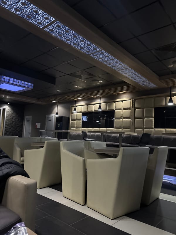 Modern lounge space with geometric lighting observed in Tutrakan