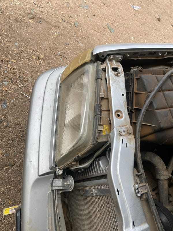 Roadside car repair documented in Jalingo, Nigeria