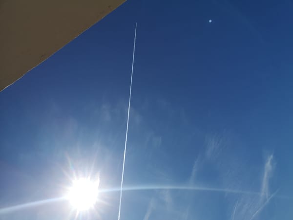 Aircraft contrail spotted in clear skies over Pardubice