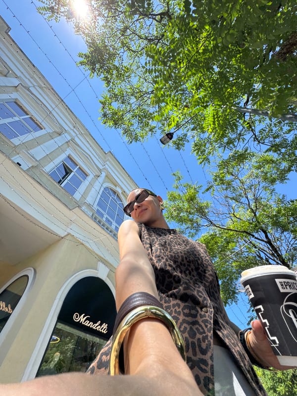 Summer morning stroll through Sochi's promenade, coffee in hand