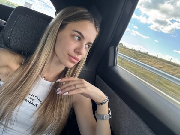 Car passenger in Zheleznik, Bulgaria looks out window
