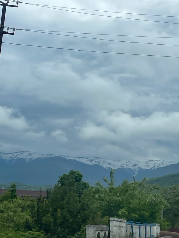 Cloudy skies documented over Tsandrypsh, Abkhazia mountain town