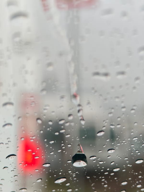 Rainy morning view through wet glass in Varna