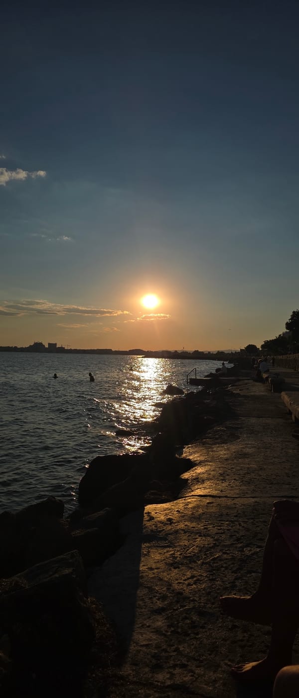 Golden sunset over the Black Sea at Pomorie's rocky shore