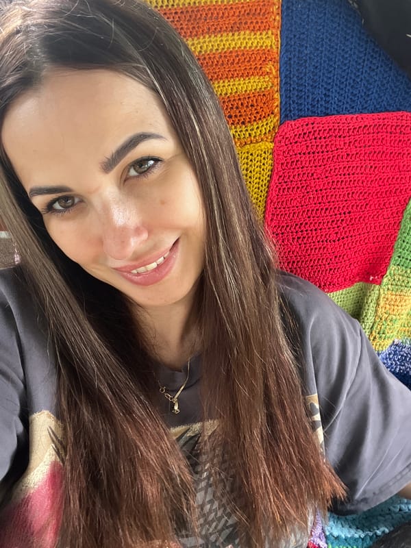 Backyard BBQ day with dogs, selfies, and charcoal grilling.