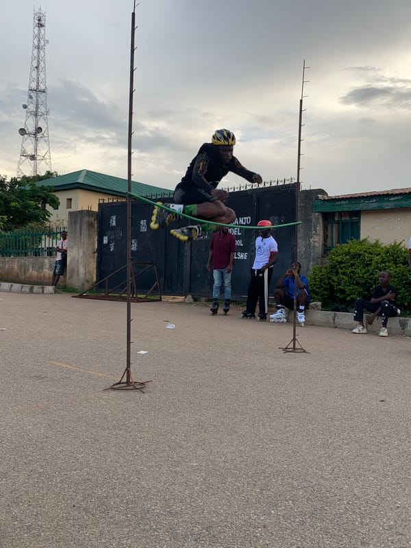 Rollerblade high jump competition outside a Jos school