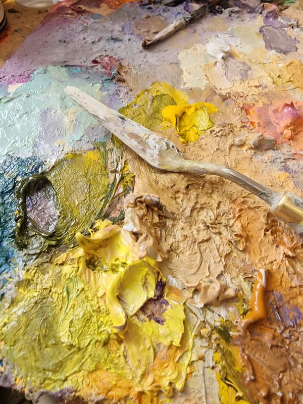 Artist's studio documented during active painting session in Bulgaria