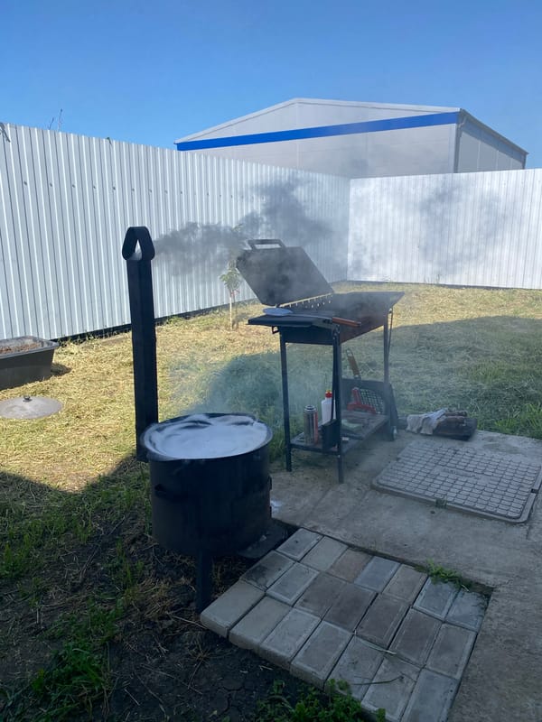 Barbecue smoker operates in outdoor setting in Industrialny, Russia