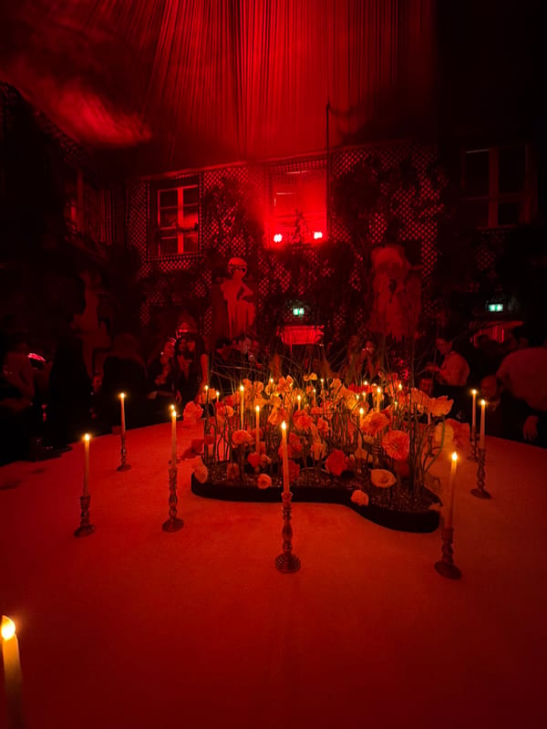 DJ event unfolds under red lights at Paris bar