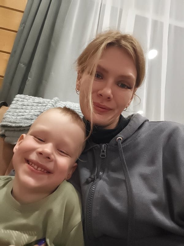 Mother and son photographed together in Русский Вожой, Russia