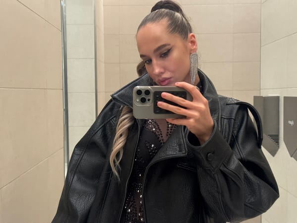 Dubai evening scenes include live performance, luxury vehicle sighting