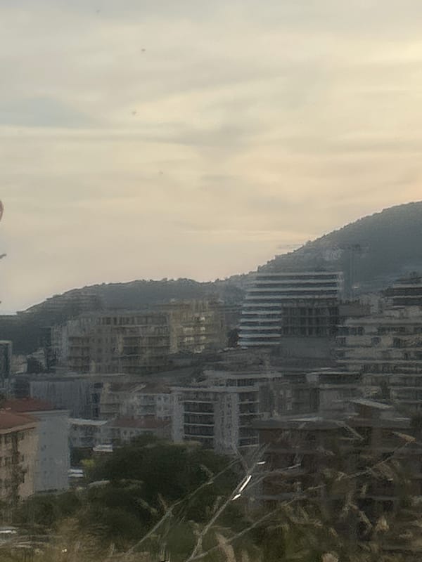 Sunset over Rafailovići's coastline, shot from a hillside vantage