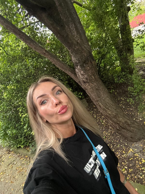 Woman documents afternoon dog walk with selfies in Armavir