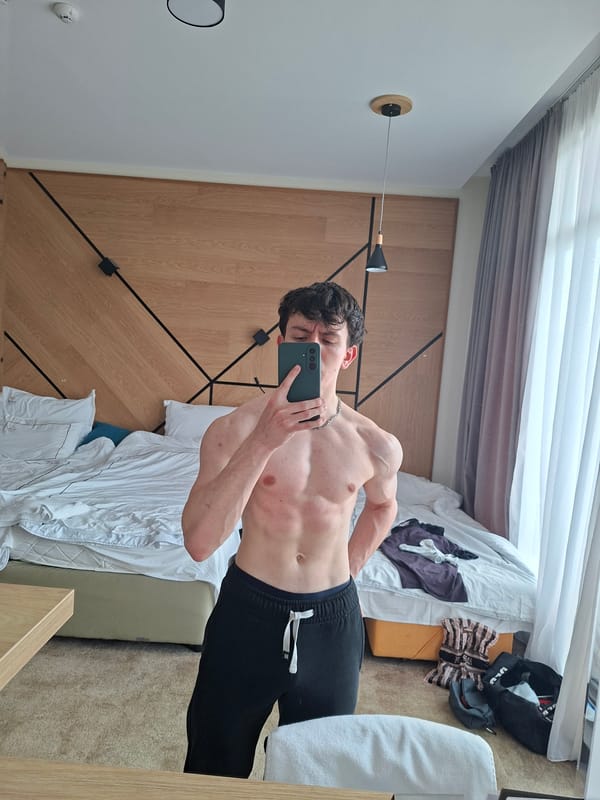 Young man takes fitness selfies in Pavel Banya hotel