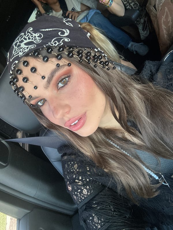 Woman photographed in vehicle on desert road in Rancho Mirage