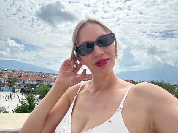 Tourist documents morning selfies, scenic views in Fethiye Turkey