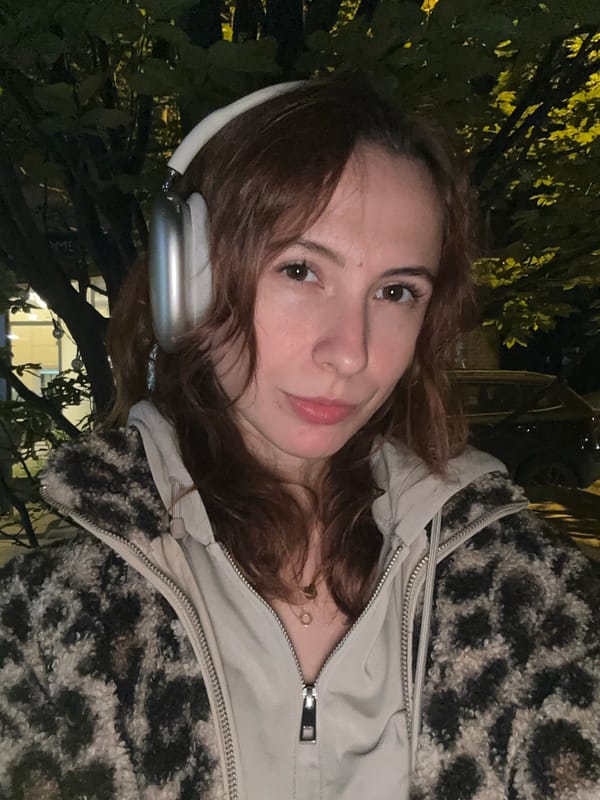 Young woman takes evening selfies in Novi Sad, Serbia