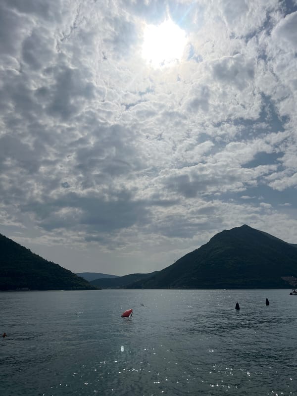 Boat crosses Bay of Kotor waters near Perast, Montenegro