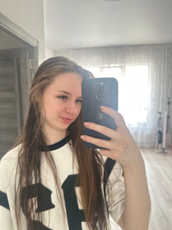 Woman takes series of selfies across indoor outdoor locations