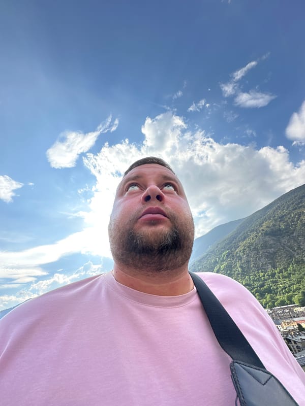 Tourist captures selfies at Encamp valley overlook in Andorra