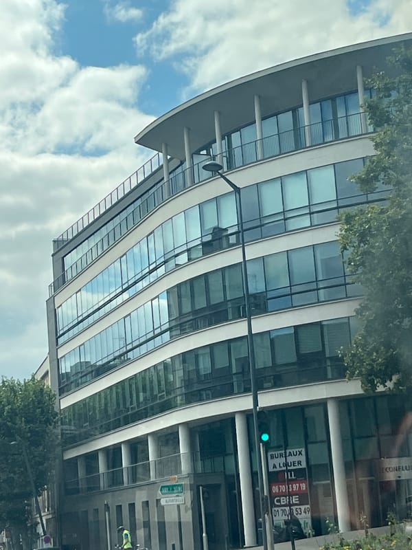 Bus ride through Maisons-Alfort, passing modern offices and local streets