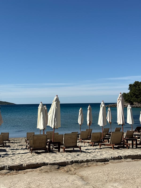 Empty beach chairs, closed umbrellas captured in Milovići, Montenegro