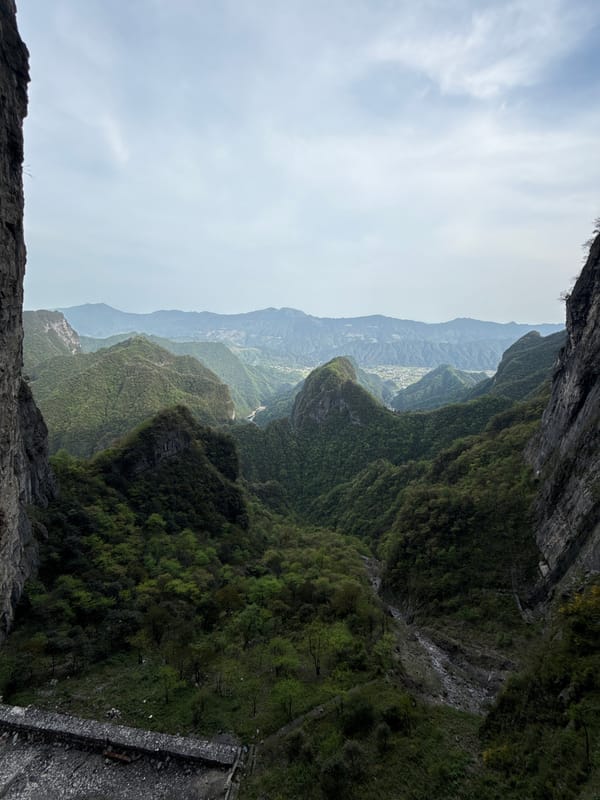 Mountainous valley landscape observed from cliff in Yongding District