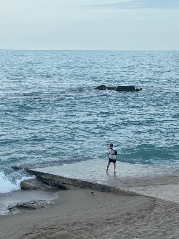 Coastal resort documented from multiple viewpoints during afternoon hours